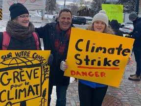 Nickel Belt MP Marc Serre joins Fridays for Future members at a pre-pandemic climate action.