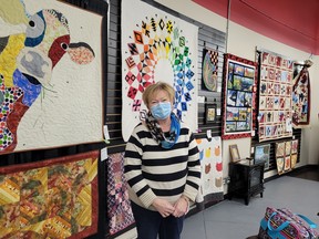 Black Gold Quilt Patch Guild President Joanne Flamand shows off the work of guild members, currently displayed at the Leduc Arts Foundry for the month of February. (Dillon Giancola)