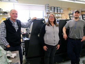 Ian Buckham, left, Rebecca Robertson and Geoff Biluszenko stand in front of some of the printing equipment at Beatty Printing in North Bay. Buckham, who has owned the business since 1990, is set to retire at the end of the month after selling the printing shop to an Aylmer-based company.
PJ Wilson/The Nugget