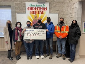 Employees from Compass Minerals salt mine and evaporator plant made a donation of $70,440 to Huron County Christmas Bureau. Funds were raised as a result of the annual lasagna dinner and raffle in the memory of Norm Laberge who died during the 2011 tornado. (L-R): Nicole O'Neill, Rural Response for Healthy Children, Katrina Clarke, Rural Response for Healthy Children, Trish Harris, Huron-Perth Children’s Aid, Gary Wardell, Unifor 16-0, Kevin Haasnoot, Unifor 16-0, Wayne McConnell, Compass Minerals and Lisa Svazich, Compass Minerals Evaporator Plant. Kathleen Smith/Postmedia