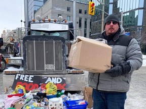 James Wolf, along with 30 others, left from Walkerton on Saturday, Feb. 5, with donations of food and water for those staying in Ottawafor the ongoing Freedom Rally. SUBMITTED