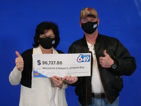 Maryanne and Robert Fullerton show off their winnings in the Dec. 15 Lotto 6/49 draw at Ontario Lottery and Gaming headquarters in Toronto.
OLG Photo