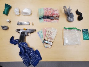 Project Renewal police officers executed a raid Wednesday at a Russell Street location and seized a handgun and cache of drugs following a drug trafficking investigation by Ontario Provincial Police with assistance from Belleville Police.