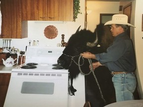 Spruce Grove resident Jim Sautner, aka the 'Buffalo Whisperer,' died at the age of 74 on Jan. 9, 2022. Photo provided by Lisa Sautner.