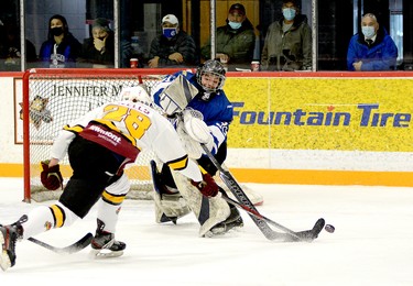 Greater Sudbury Cubs goalie Jake Marois fires the puck past the outstretched stick of Timmins Rock forward Liam Wells during the first period of Monday afternoon’s NOJHL contest at the McIntyre Arena. The Cubs went on to double up the Rock 6-3 in the conclusion of their three-game weekend road trip. THOMAS PERRY/THE DAILY PRESS