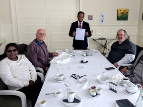 After more than a decade serving newcomers across Perth, Huron, Wellington, Middlesex and Oxford counties, volunteers and board members with the Multicultural Association of Perth Huron celebrated the association's recent designation as a registered charity at The Bruce Hotel in Stratford Saturday morning. Pictured, association founder and executive director Dr. Gezaghn Wordofa holds up the official paperwork detailing the organization's status as a registered charity alongside volunteers Madhu Dhariwal, Steve Landers and Hira Dhariwal, and board member Chris Fournier. Galen Simmons/The Beacon Herald/Postmedia Network
