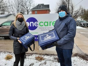 Goderich business professionals, Erin Wilson of Coldwell Banker and Jeff Bauer of Royal LePage Heartland Realty help to deliver Meals on Wheels during a time when the need for this service continues to be high. Submitted