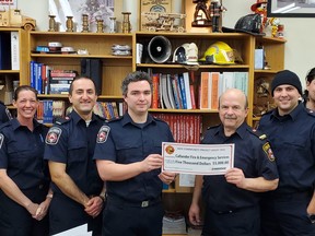 Enbridge Gas donated $5,000 to the Callander Fire & Emergency Services to purchase firefighting training materials. Volunteer firefighters Brian Dreany, left, Angela Legere and Clarke Heipel, Braden Shuman, president of the Callander Volunteer Firefighters Association and Firefighter Lieutenant Ray Tambeau and firefighters Nick Graham andDanny Desrochers hold the donation at the station.