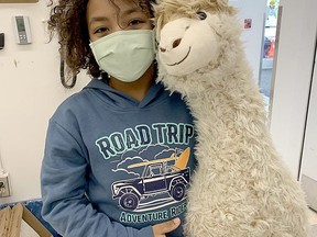 Landen Del Mastro, a Grade 5 student from Algonquin Road Public School, holds Al the Alpaca, the classroom mascot, in teacher Lindsay Kolari’s class.