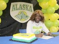 At a festive event held in her honour by her gym, Heels Over Head Xperience Gymnastics, Okeri Venn, 18, of Petawawa signs her Letter of Intent to attend the University of Alaska Anchorage where she will compete in gymnastics at the NCAA Division 1 level. Venn was offered a full-ride scholarship by the university. Anthony Dixon