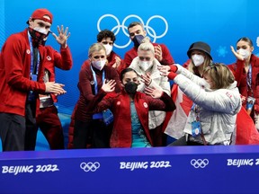 Madaline Schizas of Team Canada reacts to their score during the women's singles' free skate team event at the Beijing Winter Olympic Games at Capital Indoor Stadium on Feb. 7, 2022, in Beijing, China. (Photo by Catherine Ivill/Getty Images)