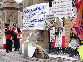 People participate in a blockade of downtown streets near the parliament building as a demonstration led by truck drivers opposing vaccine mandates. (Photo by Scott Olson/Getty Images)