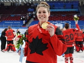 BEIJING, CHINA - FEBRUARY 17: Gold medal winner Rebecca Johnston #6 of Team Canada celebrates after the Women's Ice Hockey Gold Medal match between Team Canada and Team United States on Day 13 of the Beijing 2022 Winter Olympic Games at Wukesong Sports Centre on February 17, 2022 in Beijing, China. (Photo by Bruce Bennett/Getty Images)