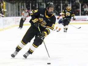 Sarnia Sting's Easton Wainwright carries the puck against the Flint Firebirds in the first period at the Progressive Auto Sales Arena in Sarnia, Ont., Monday, February 21, 2022. Mark Malone/Chatham Daily News/Postmedia Network