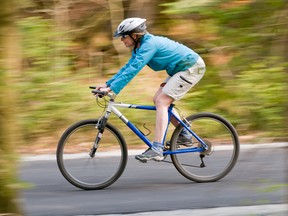 Woman bike riding; Cycling