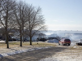 Egremont Road was closed for a time as firefighters put out a barn fire at 8519 Egremont Road in Watford, Ont. on Thursday February 24, 2022. Derek Ruttan/The London Free Press/Postmedia Network