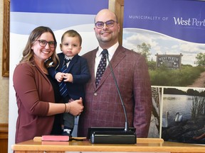 New West Perth councillor Ryan Duck poses for a family photo with wife Jenna and son Ryker after his swearing-in ceremony Feb. 9. ANDY BADER/MITCHELL ADVOCATE