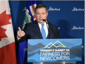 Premier Jason Kenney to reporters at the inaugural Premier's Summit on Fairness for Newcomers at the Telus Convention Centre. Wednesday, February 16, 2022. BRENDAN MILLER/POSTMEDIA