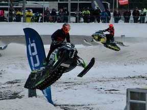 Pro racers catching air at the Royal Distributing Cup Canadian Snowcross Racing Association stop Sunday afternoon at Sauble Speedway. (Scott Dunn/The Sun Times/Postmedia Network)