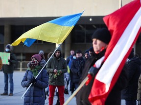 Ukrainian supporters rally after Russia launched a massive military operation against Ukraine, in Toronto February 24, 2022.