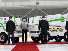 Municipal staff pose with two new electric-powered Zambonis that will be used at the Wayne Gretzky Sports Centre.
