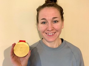 Jocelyne Larocque of Brantford, a member of Canada's national women's hockey team, shows the gold medal she won at the 2022 Winter Olympics in Beijing. SUBMITTED PHOTO