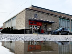 The Brockville post office is reflected in a puddle on Buell Street during Wednesday afternoon's thaw. (RONALD ZAJAC/The Recorder and Times)