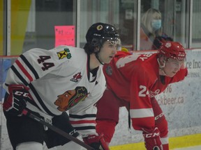 Brockville defenceman and captain Thomas Haynes and Pembroke Lumber Kings forward Jesse Kirkby await a faceoff in the Braves' end at the Brockville Memorial Centre on Friday night. Haynes was named second star in Brockville's 3-1 victory.
Tim Ruhnke/The Recorder and Times