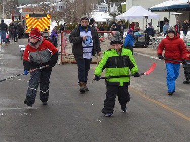 Road hockey on a closed section of Dibble Street East was one of several outdoor activities that were part of the Town of Prescott's Family Fun Day at the Leo Boivin Community Centre on Monday.
Tim Ruhnke/The Recorder and Times