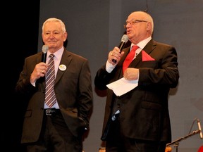 Palliative Care Telethon co-chairmen Wayne Blackwell, left, and Bruce Wylie prepare to announce the fundraising total from the event on the stage of the Brockville Arts Centre on  Sunday, Feb. 23, 2020. (FILE PHOTO)