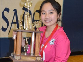 Chyna Robertson holds the LGSSAA trophy after the St. Mary Crusaders won the Leeds Grenville senior girls volleyball championship in Feb. 2020. There will be no LGSSAA titles awarded this winter, but there are games being scheduled for the next two weeks to end the season following a pause that began in December.
File photo/The Recorder and Times