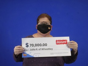 Julia Reid of Wheatley won $70,000 playing Instant Supreme 7. Last year she won $400,000 playing Instant Plinko.