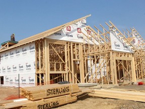 A file photo shows home building activity.