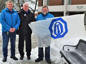 Optimist Club of Cornwall President Ken Montgomery, Cornwall Mayor Glen Grant and former club president Terry Muir were on hand for the flag raising in honour of Optimist Day, on Thursday February 3, 2022 in Cornwall, Ont. Francis Racine/Cornwall Standard-Freeholder/Postmedia Network