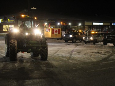 And they're off, the 6 a.m. start of the Tractor Convoy to Ottawa 2.0, at a shopping plaza parking lot in Alexandria. Photo on Saturday, February 5, 2022, in Alexandria, Ontario. Todd Hambleton/Standard-Freeholder/Postmedia Network