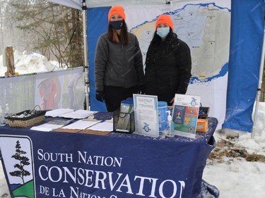 From left, SNC communications specialist Shannon Gutowski with SNC stewardship and outreach assistant Kelsey Smith, celebrating SNC's 75 years of conservation on Saturday February 12, 2022 in Berwick, Ont. Shawna O'Neill/Cornwall Standard-Freeholder/Postmedia Network