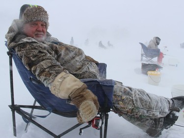 Jim Jackson, one of hundreds of participants braving what was some fierce weather on Saturday afternoon at the Alexandria Ice Fishing Derby.Photo on Saturday, February 19, 2022, in Alexandria, Ontario.Todd Hambleton/Standard-Freeholder/Postmedia Network