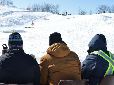 The judges watch as intermediate snowboarders show their skills during the first ski and snowboard competition held at Big Ben in 11 years on Saturday February 26, 2022 in Cornwall, Ont. Shawna O'Neill/Cornwall Standard-Freeholder/Postmedia Network