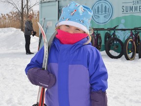 Quinn MacEachern was bundled up and ready to put on her skis at the first ever Skifest at the Summerstown Trails on Sunday February 27, 2022 in Summerstown, Ont. Shawna O'Neill/Cornwall Standard-Freeholder/Postmedia Network