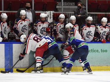 Players on the Cornwall Colts bench watch teammates fight for possession along the boards during play against the Hawkesbury Hawks on Thursday February 10, 2022 in Cornwall, Ont. The Colts lost 6-2. Robert Lefebvre/Special to the Cornwall Standard-Freeholder/Postmedia Network