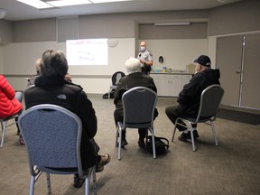 Sgt. Chris Mosley discussed a variety of policing issues with the public at a town hall meeting last Saturday morning at the Devon Community Centre. (Ted Murphy)