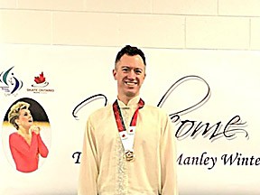 Dr. Keuhl poses with his medal in Ottawa. Photo Provided
