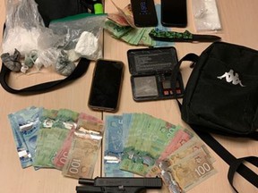 Cocaine, crystal methamphetamine, hydromorphone pills, cash, a Glock pistol, 10 rounds of ammunition, and other items used to traffic drugs that were found in Kingston by police on Thursday, Feb. 10.