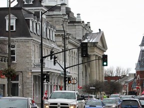 "Freedom Convoy" participants drive past City Hall in Kingston on Monday.