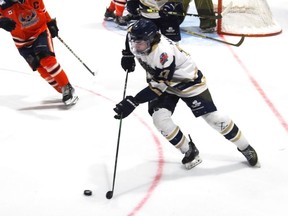 Kirkland Lake Gold Miner Luca Maiuri picks up the puck and looks to make a play against Sault Ste. Marie.