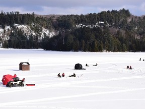 Photo by KEVIN McSHEFFREY
On a bright sunny Sunday afternoon many were enjoying ice fishing on lakes in the Elliot Lake area. Ice anglers were fishing on Horne Lake, located next to Highway 108. Anglers don’t have to go far to put a line in the water in this area. Some lakes are only about five minutes from their front door.