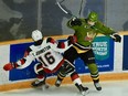 Mitchell Russell of the North Bay Battalion upends Thomas Johnston of the visiting Ottawa 67's in Ontario Hockey League play Sunday. The Sault Ste. Marie Greyhounds are at Memorial Gardens for games Thursday and Friday nights.
Sean Ryan Photo