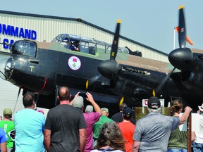 Many spectators watched the Lancaster engines run July 24, 2021 at the Bomber Command Museum of Canada. STEPHEN TIPPER
