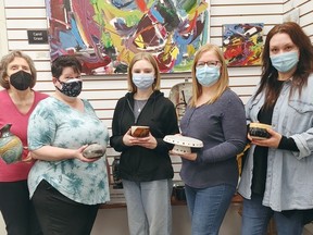 Throughout the month of February, members of the Deep River Potters' Guild will have their work on display at the Valley Artisans' Co-op on Highway 17 in Deep River. Here guild members (from left) Alison Packer, Cindy Hadden, Molly Reid, Tanya Reid and Tess Carina show off some of their work.