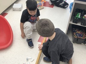 Students in Mrs. Brohart’s Grade 2/3 class at St. Francis of Assisi working on designing their own Rube Goldberg machines. RCCDSB photo